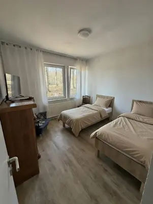 Łóżko lub łóżka w pokoju w obiekcie Pokoje na wynajem Rybnik Rudzka
