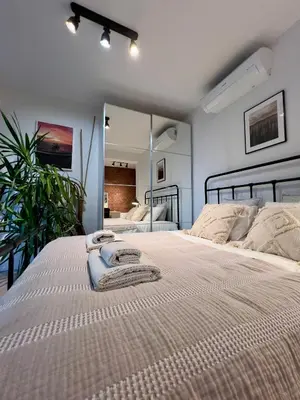 Łóżko lub łóżka w pokoju w obiekcie Wyjątkowy apartament blisko ZOO