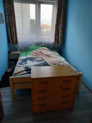 Łóżko lub łóżka w pokoju w obiekcie mieszkanie dla zwykłych ludzi