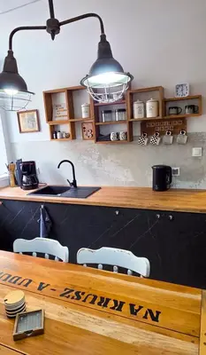 Kuchnia lub aneks kuchenny w obiekcie Apartament Antracytowe Wrota 2