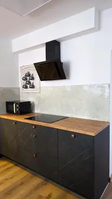 Kuchnia lub aneks kuchenny w obiekcie Apartament Antracytowe Wrota 2