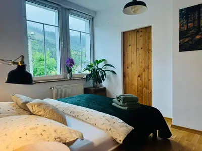 Łóżko lub łóżka w pokoju w obiekcie Rezydencja pod Borową