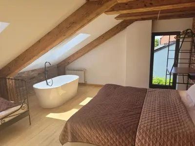 Łóżko lub łóżka w pokoju w obiekcie Villa Rustica