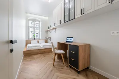 Łóżko lub łóżka w pokoju w obiekcie K73UrbanNest