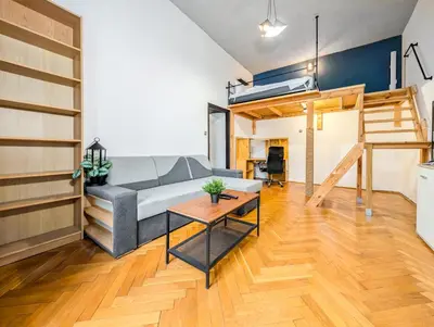 Część wypoczynkowa w obiekcie Pomorska Cosy Studio with Mezzanine by BookingHost