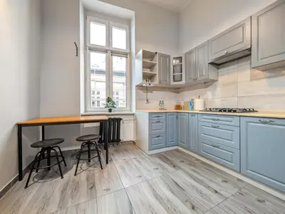 Kuchnia lub aneks kuchenny w obiekcie Pomorska Cosy Studio with Mezzanine by BookingHost