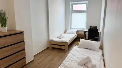 Łóżko lub łóżka w pokoju w obiekcie Kamienna na Szlaku by LibertaRent