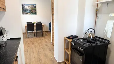 Kuchnia lub aneks kuchenny w obiekcie Kamienna na Szlaku by LibertaRent