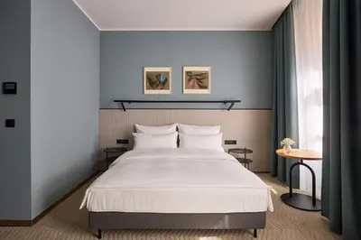Łóżko lub łóżka w pokoju w obiekcie Wroclaw Hotel