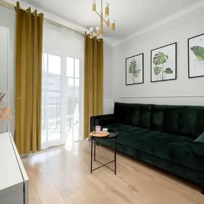 Dark Green Apartment in Wrocław Center with Desk and Balcony by Noclegi Renters