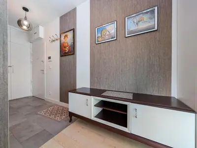 Telewizja i/lub zestaw kina domowego w obiekcie Riverside Modern Studio by BookingHost