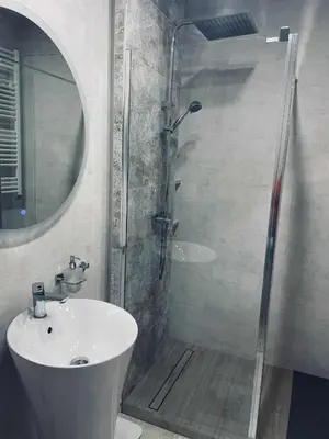 Łazienka w obiekcie Apartament NATALKA SPA ul Traugutta