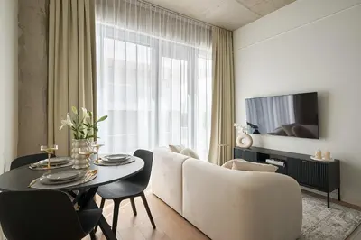 Telewizja i/lub zestaw kina domowego w obiekcie River Premium Apartment D