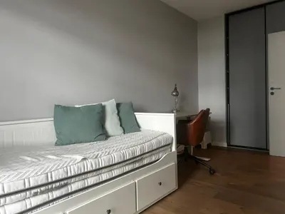 Łóżko lub łóżka w pokoju w obiekcie Komfortowe Apartamenty Nad Odrą