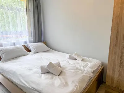 Łóżko lub łóżka w pokoju w obiekcie Piaskowa Stay by LibertaRent