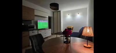 Telewizja i/lub zestaw kina domowego w obiekcie Pogodne Mieszkanko