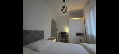 Łóżko lub łóżka w pokoju w obiekcie Pogodne Mieszkanko