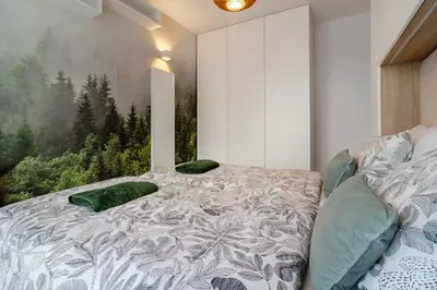 Łóżko lub łóżka w pokoju w obiekcie ZIELONA Walonska, free parking