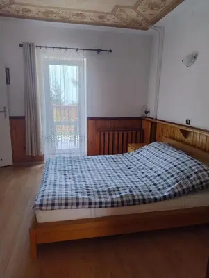 Łóżko lub łóżka w pokoju w obiekcie Villa Górski Spokój