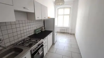 Kuchnia lub aneks kuchenny w obiekcie Aparttrans Wroclaw Botanic Garden