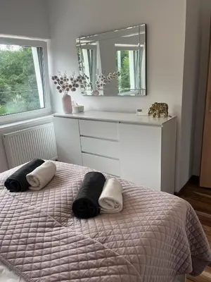 Łóżko lub łóżka w pokoju w obiekcie Apartament Perła w Kłodzku