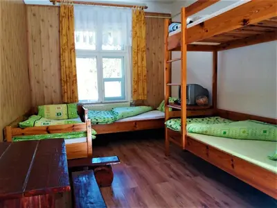 Łóżko lub łóżka w pokoju w obiekcie Zbójnicki Ostęp