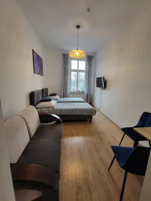Telewizja i/lub zestaw kina domowego w obiekcie AS ELITE Studio Kozielska 12 parking Blisko Onkologii