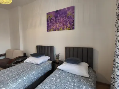 Łóżko lub łóżka w pokoju w obiekcie AS ELITE Studio Kozielska 12 parking Blisko Onkologii