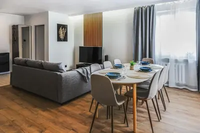 Część wypoczynkowa w obiekcie Komfortowy Apartament Jacuzzi & Balkon & 2 sypialnie