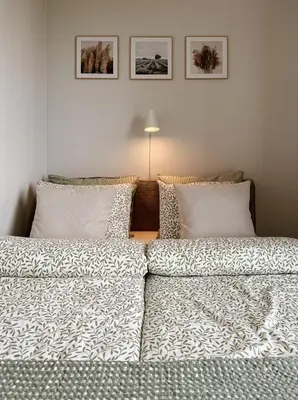 Łóżko lub łóżka w pokoju w obiekcie Legnicka Residence 38