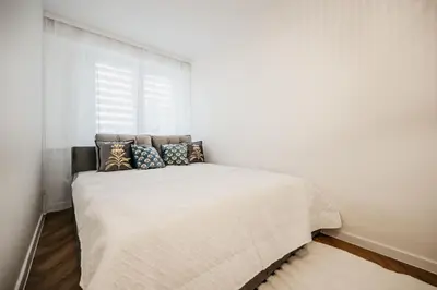 Łóżko lub łóżka w pokoju w obiekcie Nocosfera Apartament Premium Zgodny