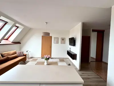 Telewizja i/lub zestaw kina domowego w obiekcie CityNest Biskupia