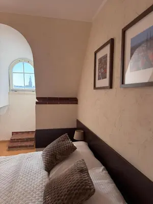 Łóżko lub łóżka w pokoju w obiekcie CityNest Biskupia