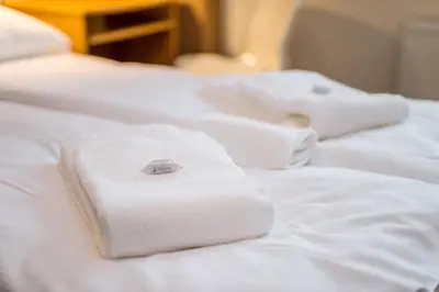 Łóżko lub łóżka w pokoju w obiekcie Inowrocławska 17 Apartamenty Platinum by Noclegi Renters