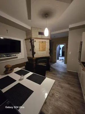 Telewizja i/lub zestaw kina domowego w obiekcie Apartamenty U Władzia