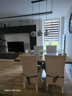 Telewizja i/lub zestaw kina domowego w obiekcie Apartamenty U Władzia