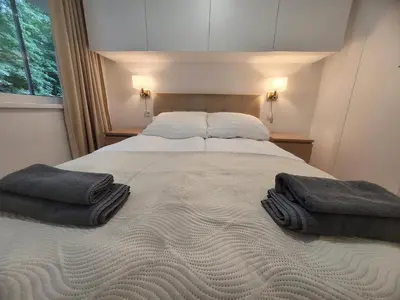 Łóżko lub łóżka w pokoju w obiekcie apartament z sauną CIS