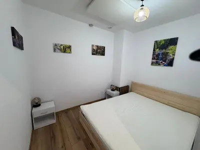 Łóżko lub łóżka w pokoju w obiekcie Na Alei