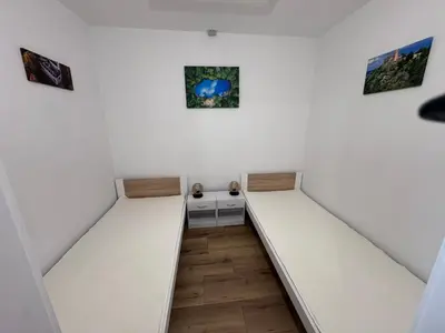 Łóżko lub łóżka w pokoju w obiekcie Na Alei