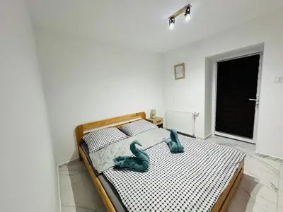 Łóżko lub łóżka w pokoju w obiekcie Górska Ostoja