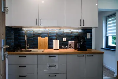 Kuchnia lub aneks kuchenny w obiekcie Lipowa Apartamenty B