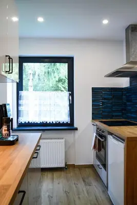 Kuchnia lub aneks kuchenny w obiekcie Lipowa Apartamenty B