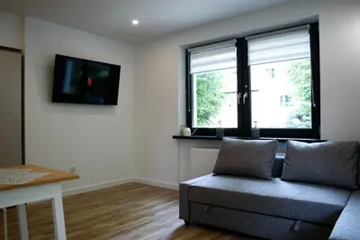 Telewizja i/lub zestaw kina domowego w obiekcie Lipowa Apartamenty B