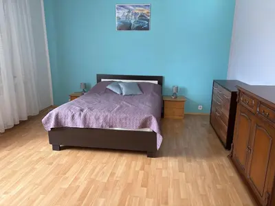 Łóżko lub łóżka w pokoju w obiekcie Apartament pod Książem