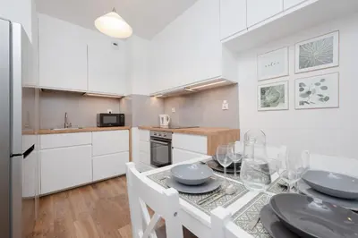 Kuchnia lub aneks kuchenny w obiekcie Apartment Legnicka Wroclaw with PARKING by Noclegi Renters
