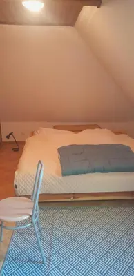 Łóżko lub łóżka w pokoju w obiekcie Apartament Zielony Zakątek