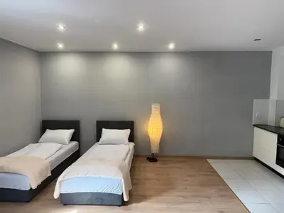 Łóżko lub łóżka w pokoju w obiekcie Apartament u Franusia