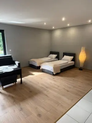 Łóżko lub łóżka w pokoju w obiekcie Apartament u Franusia