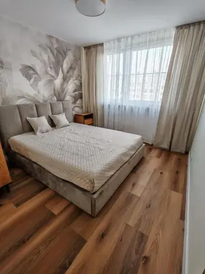 Łóżko lub łóżka w pokoju w obiekcie Panorama apartament