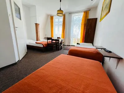 Łóżko lub łóżka w pokoju w obiekcie Ośrodek Wypoczynkowy Agat